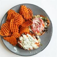 Grilled Buffalo Chicken Sandwich · grilled chicken breast / midwest greens / high five garlic sauce / blue cheese crumbles / to...