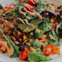 Vegan Chorizo · House potatoes, fresh corn, red peppers, onions, broccoli, spinach, garnished with vegan chi...