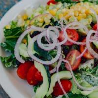 Vegan Cobb Salad · Romaine, avocado, grape tomatoes, fresh corn, black beans, red onions, cucumber and our deli...