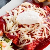 Enchiladas El Diablo · Three enchiladas filled with choice of meat topped with spicy devil sauce and topped with ch...