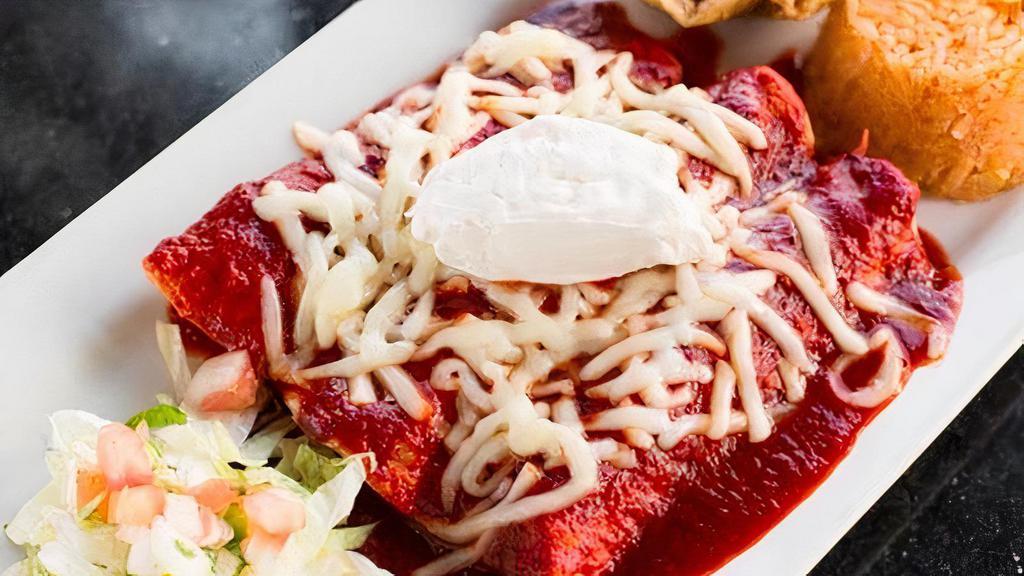 Enchiladas El Diablo · Three enchiladas filled with choice of meat topped with spicy devil sauce and topped with chorizo, melted chihuahua cheese, and sour cream.