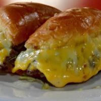 Sausage Cheeseburger · Voted Oklahoma's best burger! Half beef and half country sausage smashed together with onion...