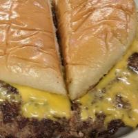 Big Daddy (1/2 Lb) · Ron's legendary giant 1/2 lb. cheeseburger with the onions fried into the meat. Buns dressed...