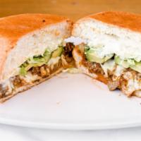 Tortas · Authentic, gourmet Mexican sandwich served with a choice of  meat on a toasted bun, lettuce,...