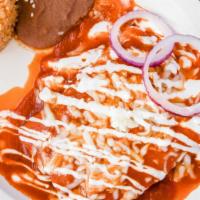 Enchiladas Suizas · Three fried corn tortilla rolls filled with meat covered with our special mild tomato sauce.
