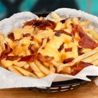 Bacon Cheese Fries · Crispy fries smothered in melted cheese and turkey bacon.