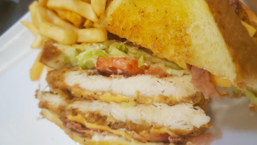 Crispy Chicken Club · Lettuce, tomato, onion, American cheese, bacon and mayo on Texas toast.