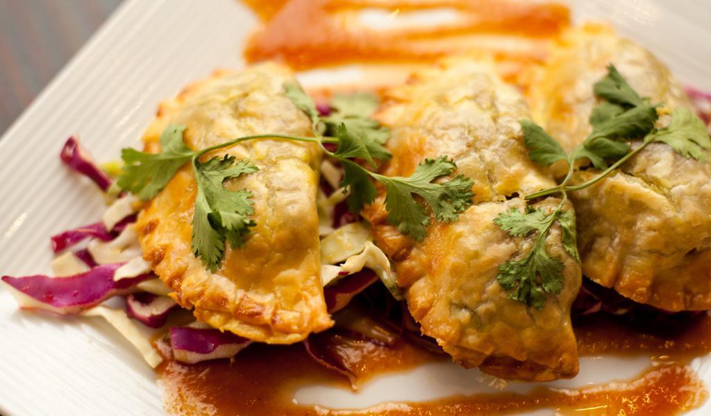 Beef Patties · A curry beef mixture stuffed into pastry shells & baked until golden. Served with a lively guava sauce.