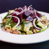 Beet Salad · A blend of leaf lettuce, spinach, avocado and fresh beetroot, tossed in our house champagne ...