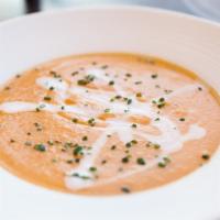 Butternut Squash Soup · A rich, thick hearty soup made from butternut squash, leeks, herbs & spices, topped with fre...