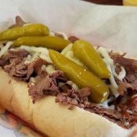 Italian Beef Sandwich · Five ounces of our thinly sliced Italian beef, served on a steamed hard roll with your choic...