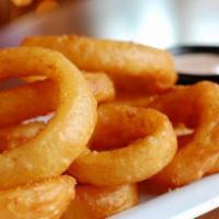 Onion Rings · An order of breaded onion rings, cooked to order in our air fryer oven.