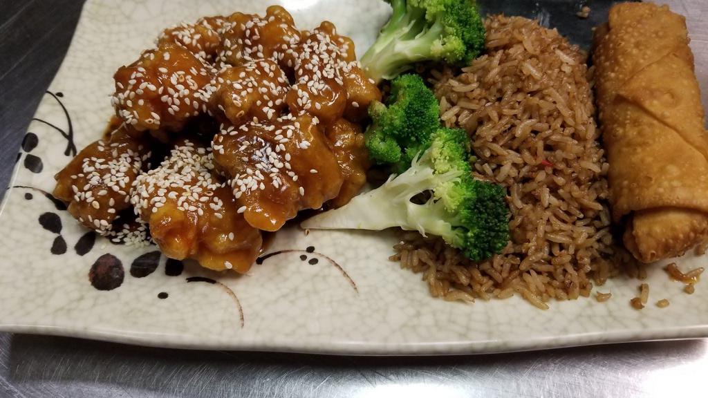 Sesame Chicken (Deep Fried) (D) (W/Steam White Rice) · Chunks of batter fried chicken in a thick savory sweet brown sauce with large dry spicy chili peppers.