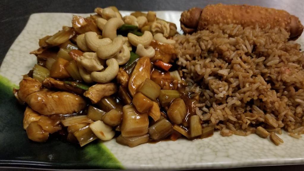 Cashew Chicken (D) (W/Steam White Rice) · Chicken bits stir fried in a savory brown sauce with snow peas, broccoli, bamboo, water-chest nuts and cashews