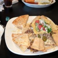 Villa Sample · Can’t make up your mind between chicken quesadillas, beef taquitos and beef nachos. Enjoy th...