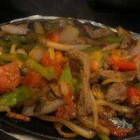 Steak · All fajitas are cooked with mushrooms, onions, tomatoes and bell peppers. Served with rice, ...