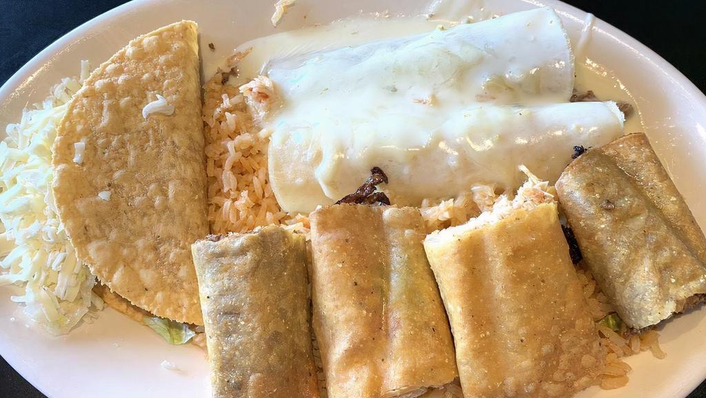 Manuel'S Combo · Two chicken taquitos Mexicanos and one chicken enchilada. Topped with onions and cheese sauce, one beef enchilada topped with mole sauce and crispy supreme taco. Served with rice and sour cream.