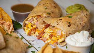 Loco Jr · With lettuce, cheese, sour cream, tomato, rice and beans. Steak, Chicken, chorizo. (Everythi...