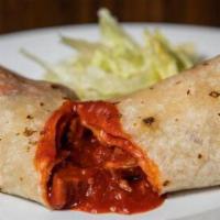 Piña Burrito · With lettuce, cheese, sour cream, tomato, rice and beans. Chicken, steak, pineapple. (Everyt...