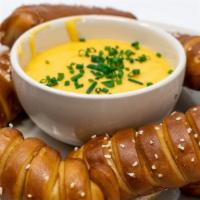 Pretzel Turn Buckles · Soft, warm pretzel sticks, jalapeno beer cheese made with our Kolsch beer and house spicy gr...
