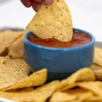 Chips 'N Salsa · A Mound of tortilla chips and house salsa while you wait.