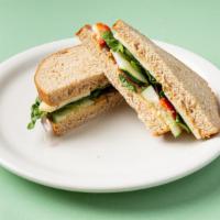 Good Earth · Pepper Jack, Hummus, Red & Green Peppers, Spinach, Tomato, Onion, Cucumber & Banana Peppers ...