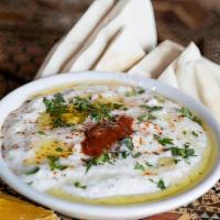 Tzatziki · Our famous award winning greek yogurt with cucumber, mint, parsley and olive oil. A great re...