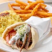 Gyros Sandwich · Your choice of lamb and beef or chicken gyros meat wrapped in pita and topped in tzatziki sa...
