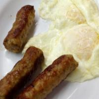 2 Eggs With Sausage · Sausage choice of patties or links.
