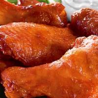 Jumbo Wings · We brine, confit and fry our wings, then toss them in your favorite sauce.