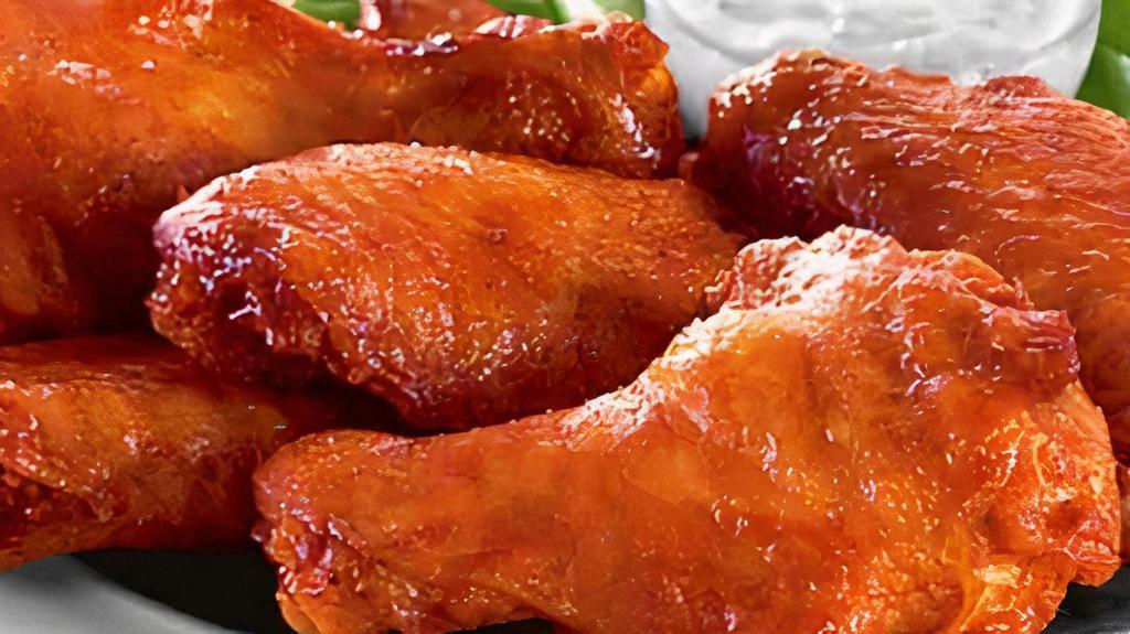 Jumbo Wings · We brine, confit and fry our wings, then toss them in your favorite sauce.