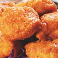 Crispy Boneless Wings · 1LB of crispy white-meat chicken, tossed in your favorite sauce. Served with ranch or bleu c...