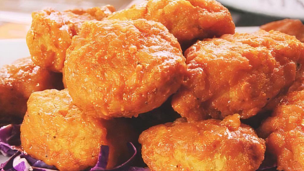 Crispy Boneless Wings · 1LB of crispy white-meat chicken, tossed in your favorite sauce. Served with ranch or bleu cheese.