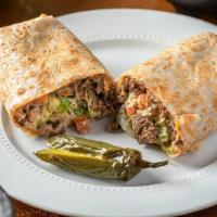 Steak Burrito · Served with lettuce, tomato, avocado, beans, cheese, sour cream and Steak.