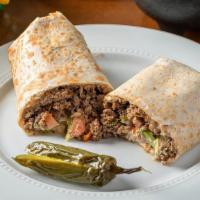 Ground Beef Burrito · Served with lettuce, tomato, avocado, beans, cheese, sour cream and Ground Beef