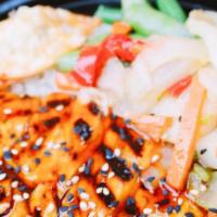 Chicken Teriyaki W/White Rice · Grilled tender chicken breast, marinated in a sweet teriyaki sauce over a bed of aromatic ja...