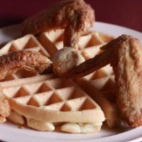 Chicken & Waffles Meal · Chicken wings or tenders served with signature waffles. W/ two sides.