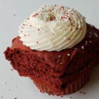 Jumbo Giant Red Velvet Elvis Cupcake · Our signature GIANT Red Velvet cake, baked with chocolate chips in the batter and topped wit...