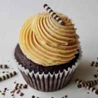 Jumbo Giant Peanut Butter Blackout · GIANT Rich chocolate cake topped with fluffy peanut butter frosting. Our jumbo cupcake is 2 ...