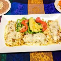 Enchiladas (3) · Three tortillas stuffed with choice of chicken, ground beef, steak or cheese. Dipped in choi...