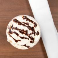 Coffee Ice Cream Frappe · Coffee ice cream, chocolate chips, chocolate sauce and whipped cream.