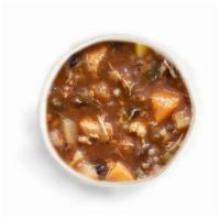 Jamaican Bay Gumbo · Brothy chicken soup with fresh scallions, whole kernel corn, carrots, celery, onions, pepper...