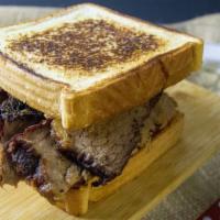 Beef Brisket Sandwich · Smoked Beef Brisket between two pieces of buttered Texas Toast or Brioche Bun, add BBQ sauce...