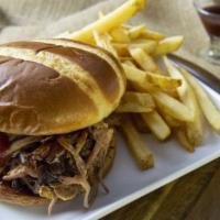 Pulled Pork Sandwich W/1 Side · Pulled Pork Sandwich, topped with BBQ Sauce w/Fries, choice of Texas Toast or Brioche Bun