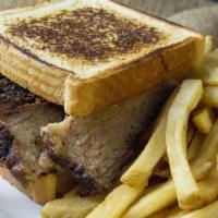 Beef Brisket Sandwich W/1 Side · Beef Brisket Sandwich w/1 Side on two pieces of buttered Texas toast, Toasted Brioche Bun or...
