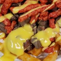 Hot Cheetos Asada Fries · seasoned or regular fries.