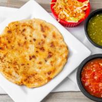 Pupusas · Pupusas are a must! All accompanied with the chef's curtido salad on the side. Please add a ...