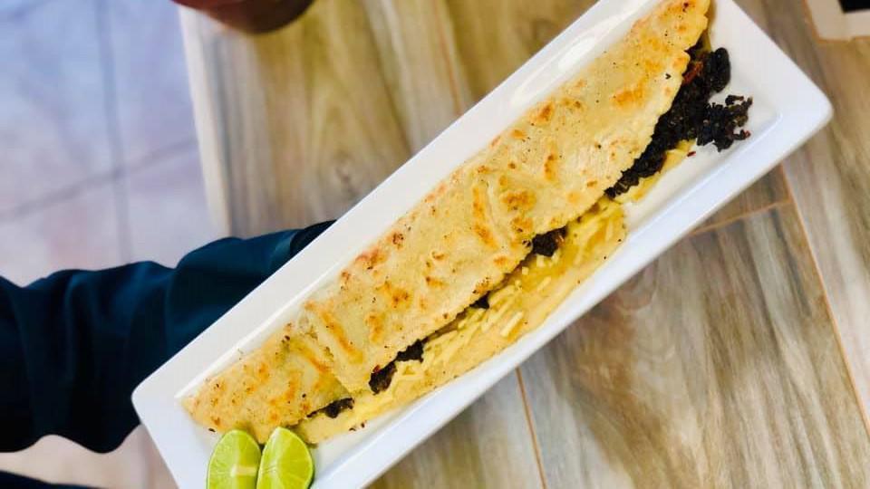 Quesadillas · Quesadillas are prepared with lettuce, cilantro, onions, sour cream, and cheese. Please add a note if you'd like any of the toppings removed.  Additional toppings will be extra.