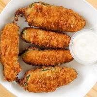 Stuffed Jalapenos · Stuffed jalapenos are breaded and fried crispy served with ranch.