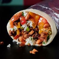 Greenarito · Burrito stuffed with rice, plant-based protein, beans, sautéed peppers & onions, salsa & veg...